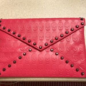 Edgy Pink Skull Embossed & Studded Clutch